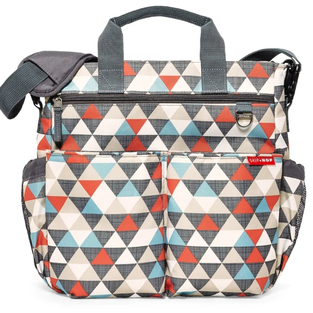 Skip Hop Diaper Bag - rip in one mesh pocket